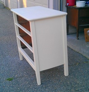 Wallpaper dresser before with a coat of paint